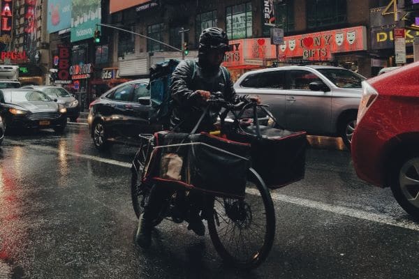 man biking in tough conditions