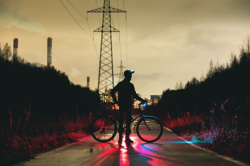 person riding their bike at night