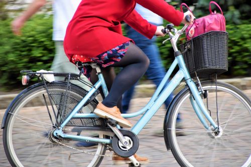 person commuting on their bike