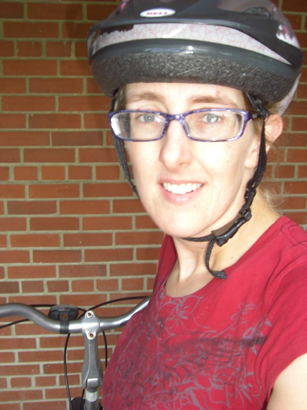 bike commuter Hilary Archbold with her bike helmet