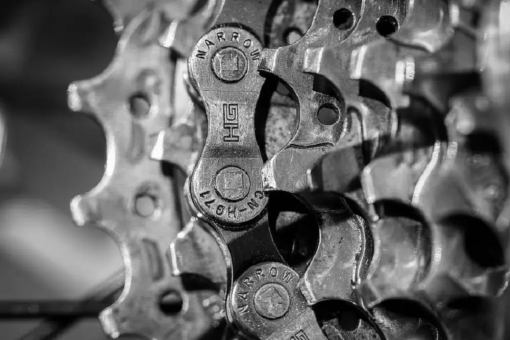 What is a bike chain master link? Close-up of a bicycle chain master link.