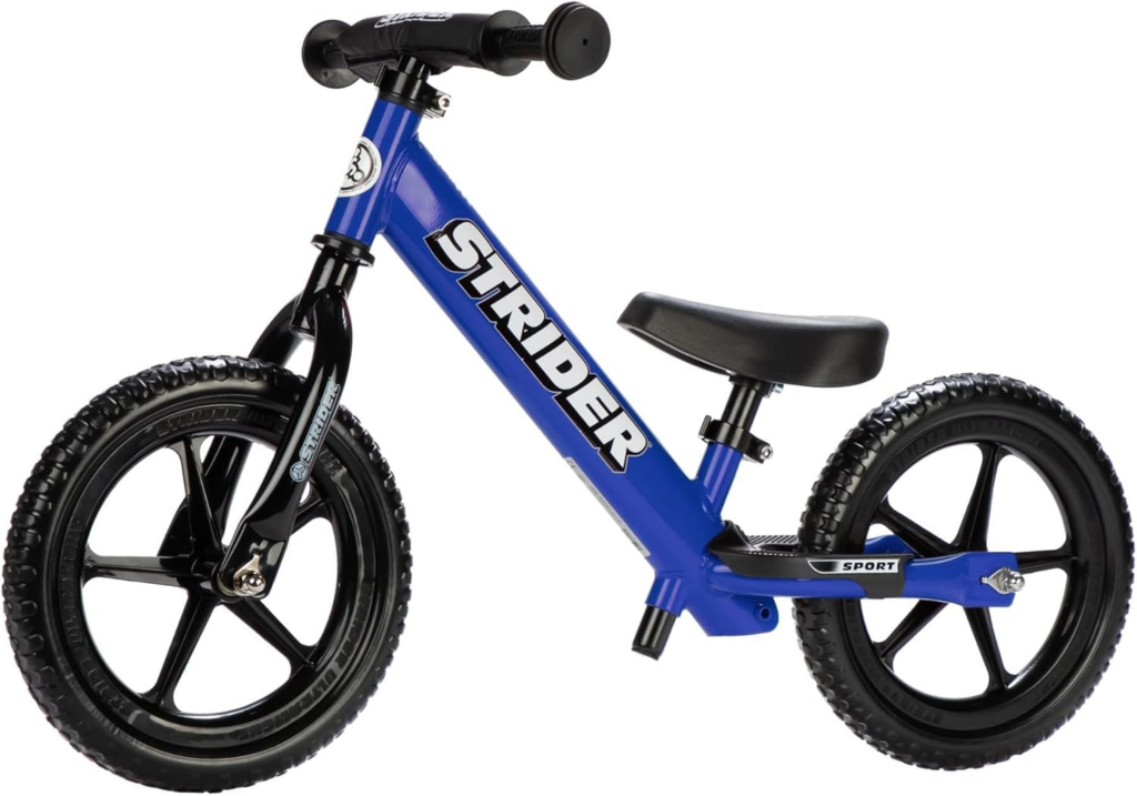 Best Bikes for 2 Year Olds: blue Strider balance bike designed for toddlers learning balance with lightweight frame and small training wheels